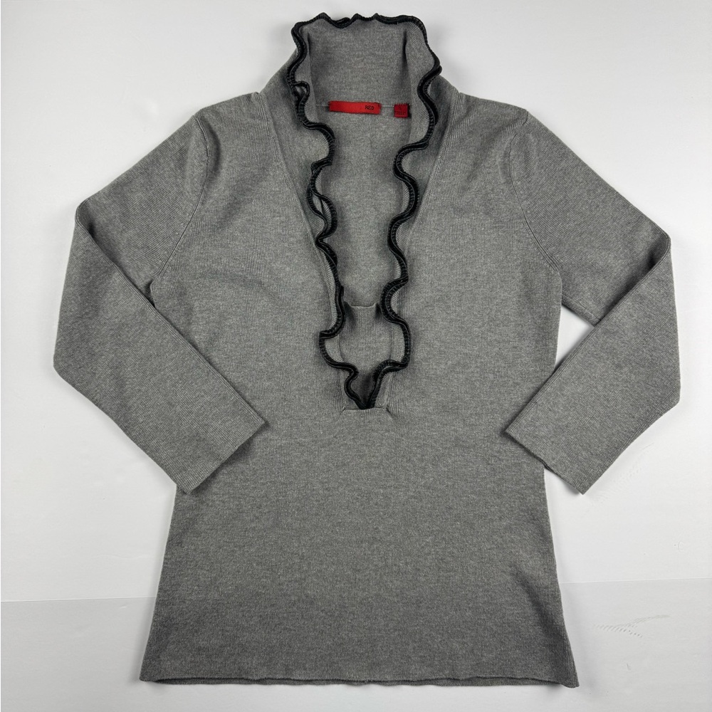 Gray long sleeve V neck sweater with black faux leather ruffled details